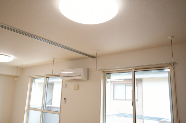 拡大写真：ジュネス向新庄２Ａ 2階203の室内物干し