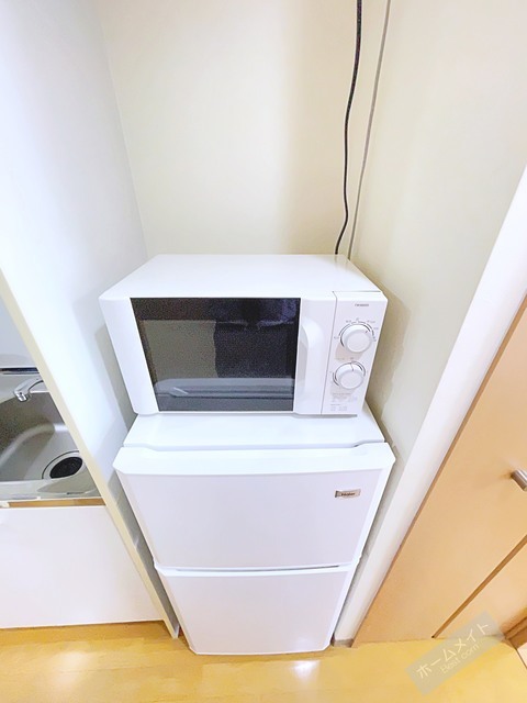 拡大写真:カーライル堺市駅前 3階303の家具家電付きの写真です。