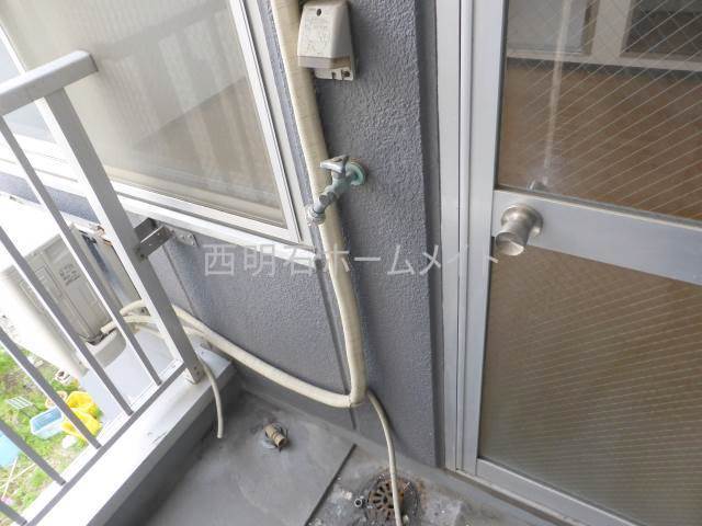 拡大写真：シーサイドマンション 2階205の洗濯機置場