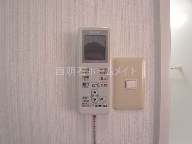 拡大写真:ソフィアコート 2階203の浴室乾燥機リモコン