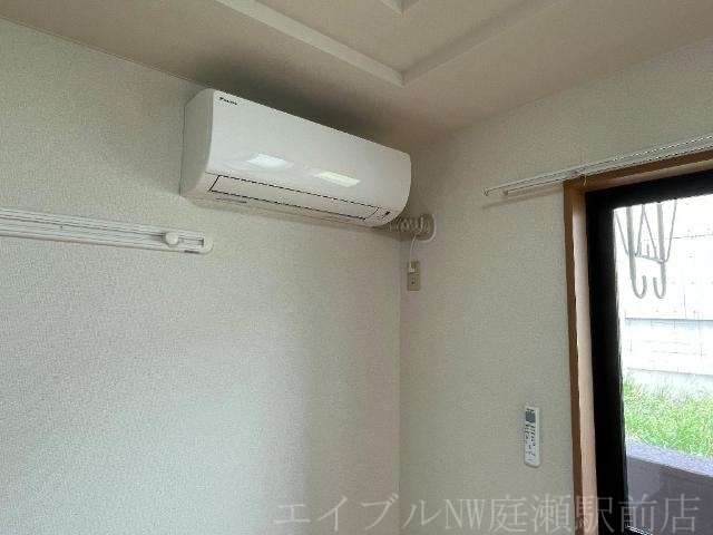 拡大写真:アルカディア 1階102のエアコン