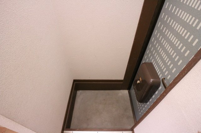 拡大写真:セオコート朝霧 1階103の玄関