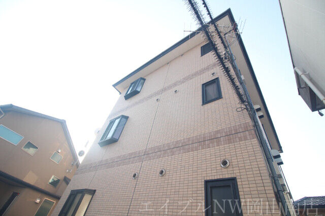 拡大写真：岡山市南区福浜西町 3階302の建物外観