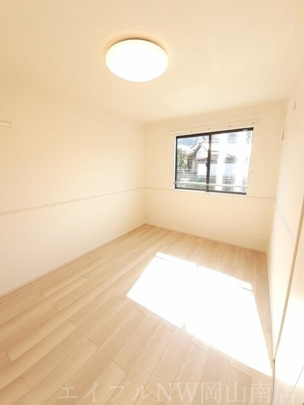 拡大写真:岡山市南区迫川 2階203の寝室