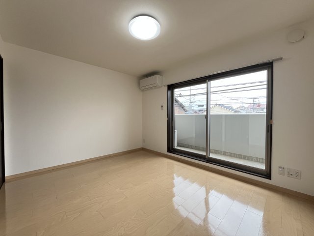 拡大写真：スカイマンションi 2階201の居間