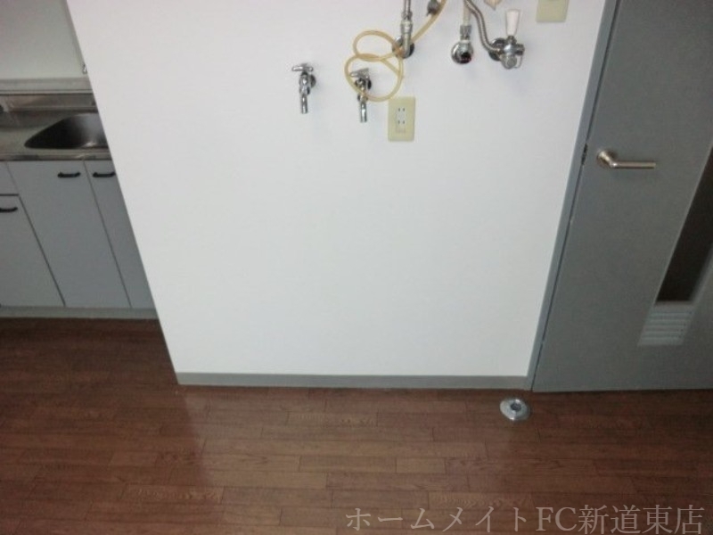 拡大写真:エミネンスN39 2階202の洗濯機置場