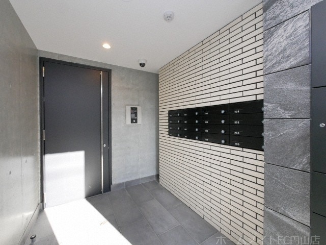 拡大写真:Livease Hassamu 1階105のエントランス