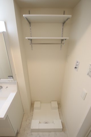 拡大写真:セジュールM 1階102の室内洗濯機置場