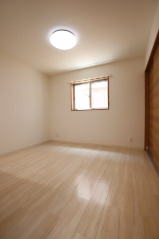 拡大写真：サンアーク北野田 2階202の居間