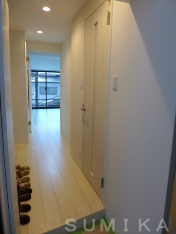 拡大写真:Casa Grande医大前 6階603の玄関