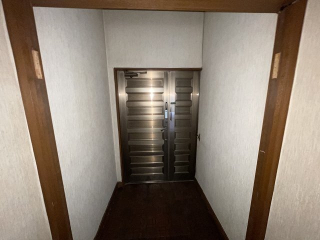 拡大写真:コーポマルニシ 1階101の玄関