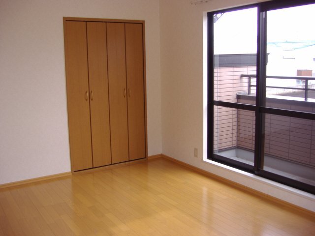 拡大写真:カーサ サンライズ 2階202の居間