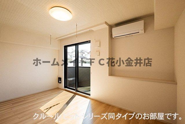 拡大写真：シャルム・レジデンス 1階102のゆったり過ごせる居間です