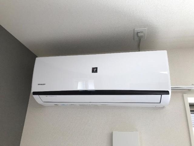 拡大写真:ニューパレス佑錦II 1階105のエアコン