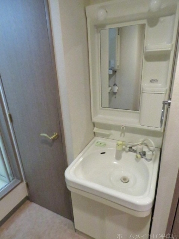 拡大写真:Gramercy Sapporo(グラマシー札幌) 3階303の洗面所