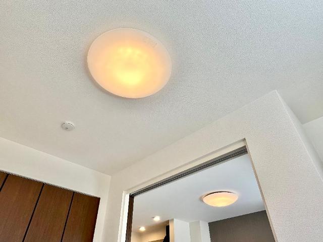 拡大写真:カーサ・デ・アモール 1階101の照明器具