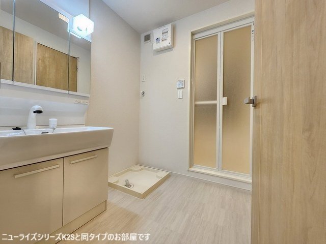 拡大写真:環(たまき) 1階103の広い洗面スペース
