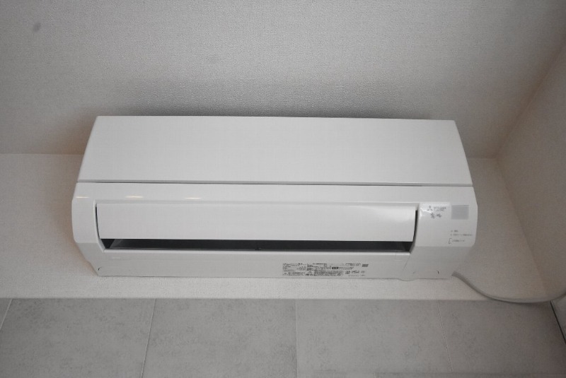 拡大写真:ラウンドヒルズK 3階303のエアコン