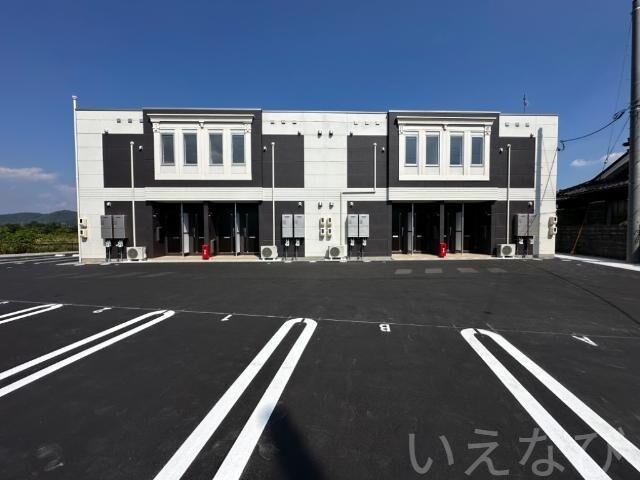 拡大写真:岡山市北区高松 1階105の外観写真(昼)