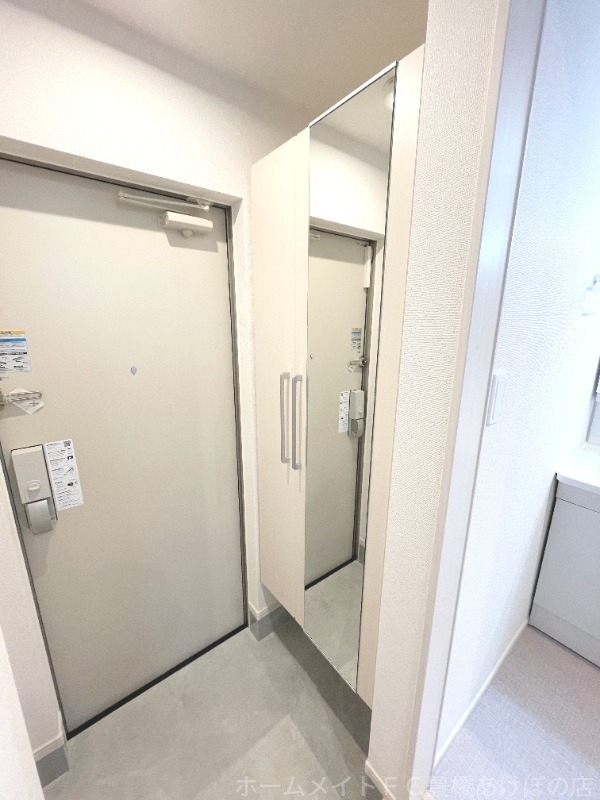 拡大写真：ヒカルサ豊橋小池 2階202の玄関