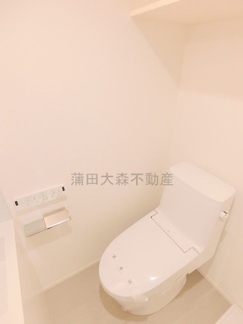 拡大写真:アバンテ池上 4階404の温水洗浄便座付きトイレ