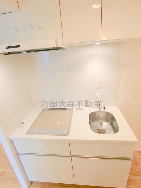 拡大写真:アバンテ池上 4階404のIHキッチン