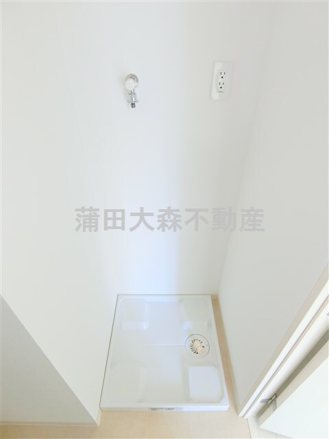 拡大写真:ウイングプレミア蒲田 2階202の室内洗濯機置き場