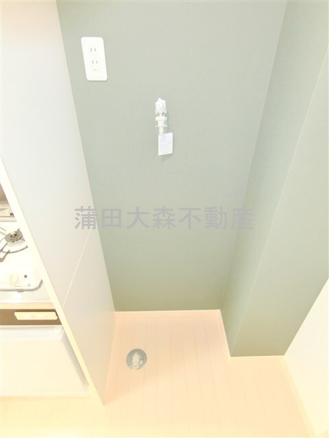 拡大写真:Well-being羽田 1階101の洗濯機置き場