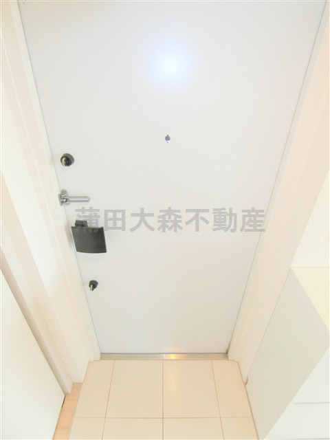 拡大写真:ディアマンテ糀谷 3階302の玄関
