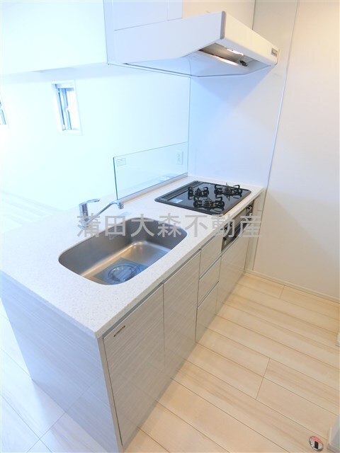 拡大写真:AXAS千鳥町アジールコートSta. 7階701の3口ガスグリル付システムキッチン カウンター