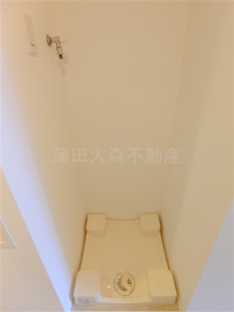 拡大写真:コンフォリア蒲田 7階711の室内洗濯機置場