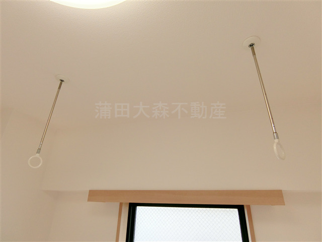 拡大写真:ルーブル東蒲田七番館 3階314の取り外し可能な室内物干し