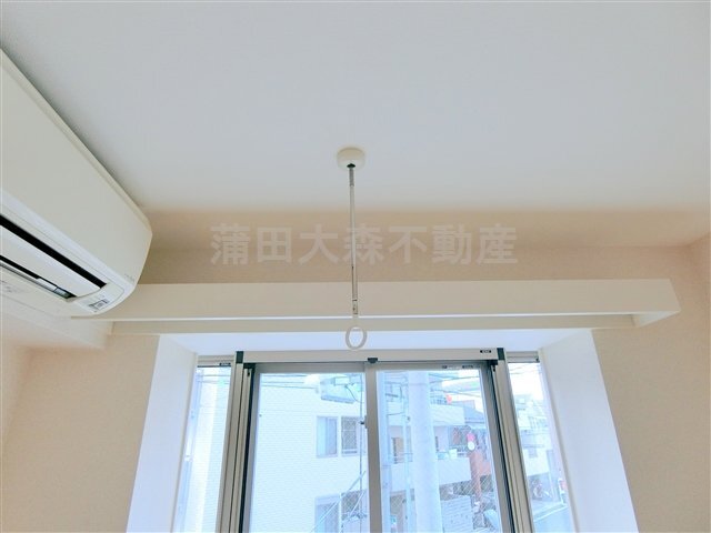 拡大写真:柳原池上マンション 4階402の室内物干しフック エアコン