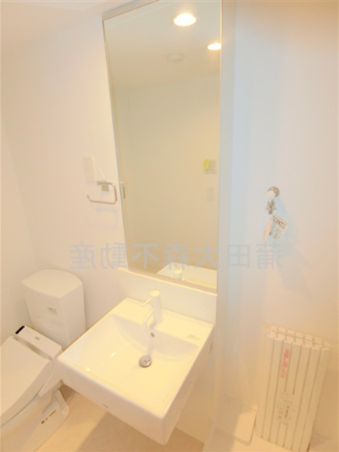 拡大写真:B.G.Grand Unoki 4階404の洗面脱衣所 独立洗面台