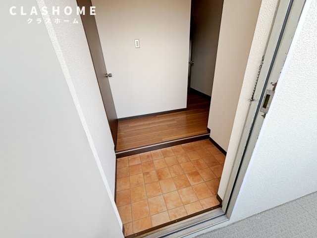拡大写真：サンライフ弁天 3階307の玄関