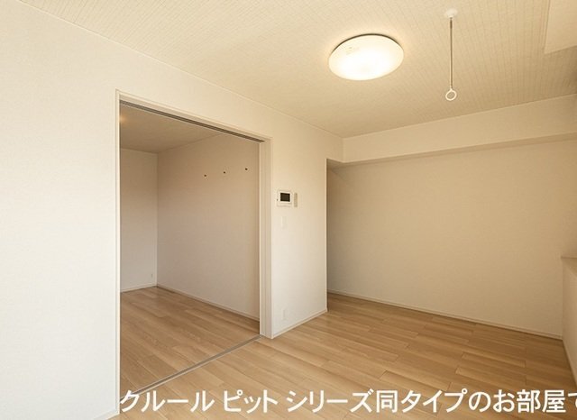 拡大写真:サンシャイン1 1階105のゆったり過ごせる居間です
