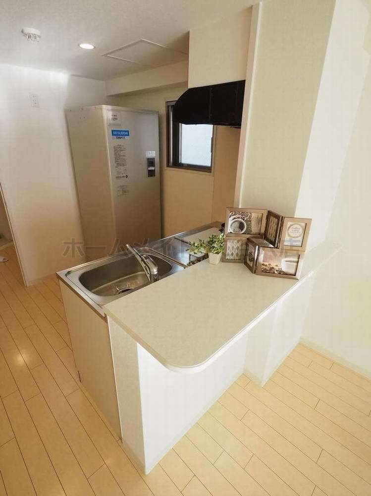 拡大写真：ソシオ心斎橋 9階902のキッチン