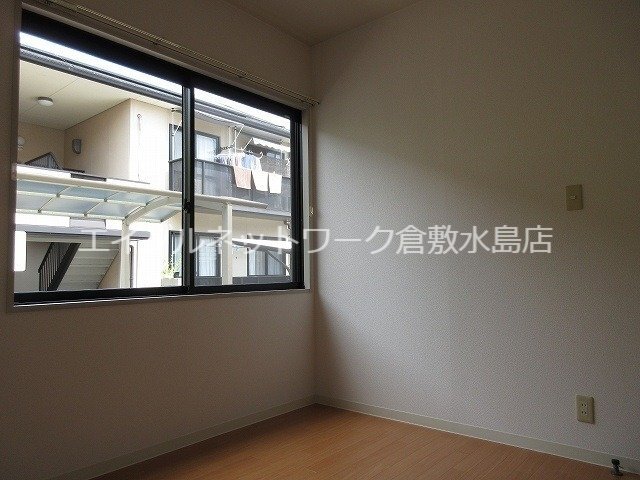 拡大写真:倉敷市玉島中央町2丁目 1階101の居間