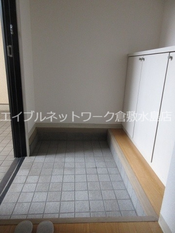 拡大写真:倉敷市玉島中央町2丁目 1階101の玄関