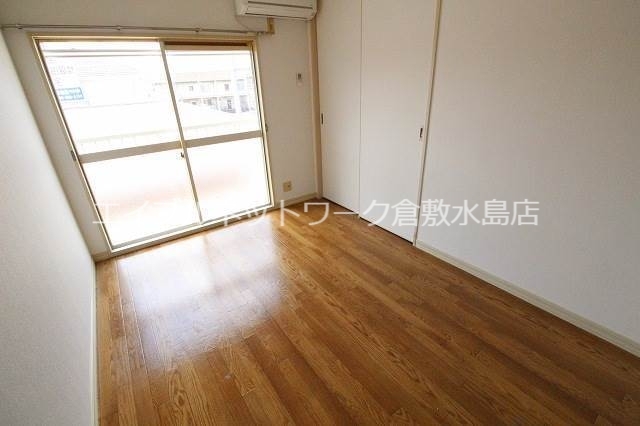 拡大写真:ドミール西口 B棟 2階201の居間