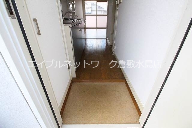 拡大写真:ドミール西口 B棟 2階201の玄関