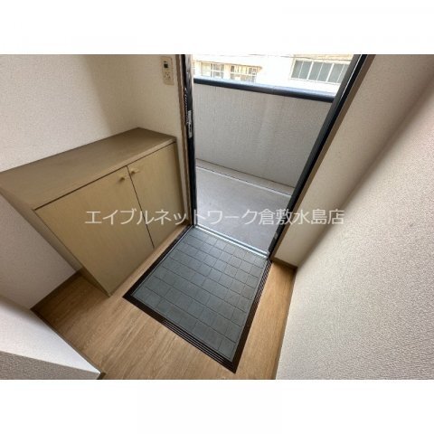 拡大写真:コウジィーコート箕島 2階202の玄関
