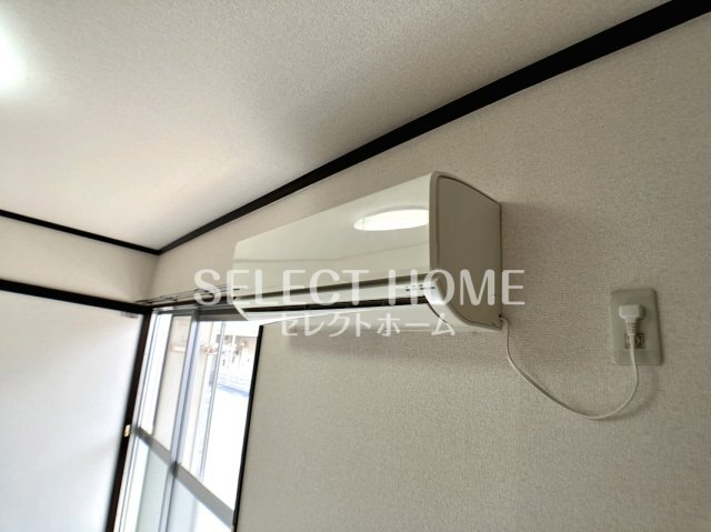 拡大写真:タウニィ石原 D棟 1階102のエアコン付き
