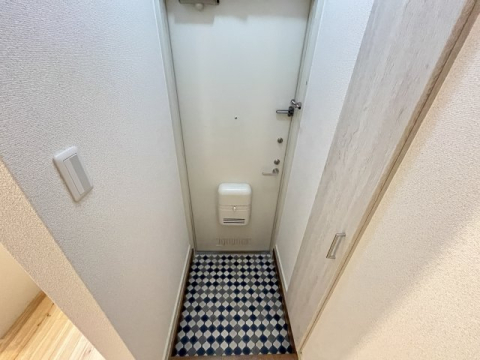 拡大写真：パークサイドハウス 1階104の玄関