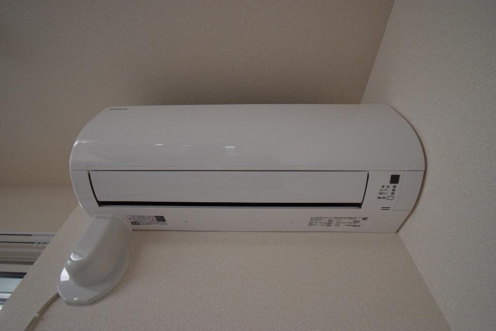 拡大写真:サンラモン本山Ⅱ 1階201のエアコン