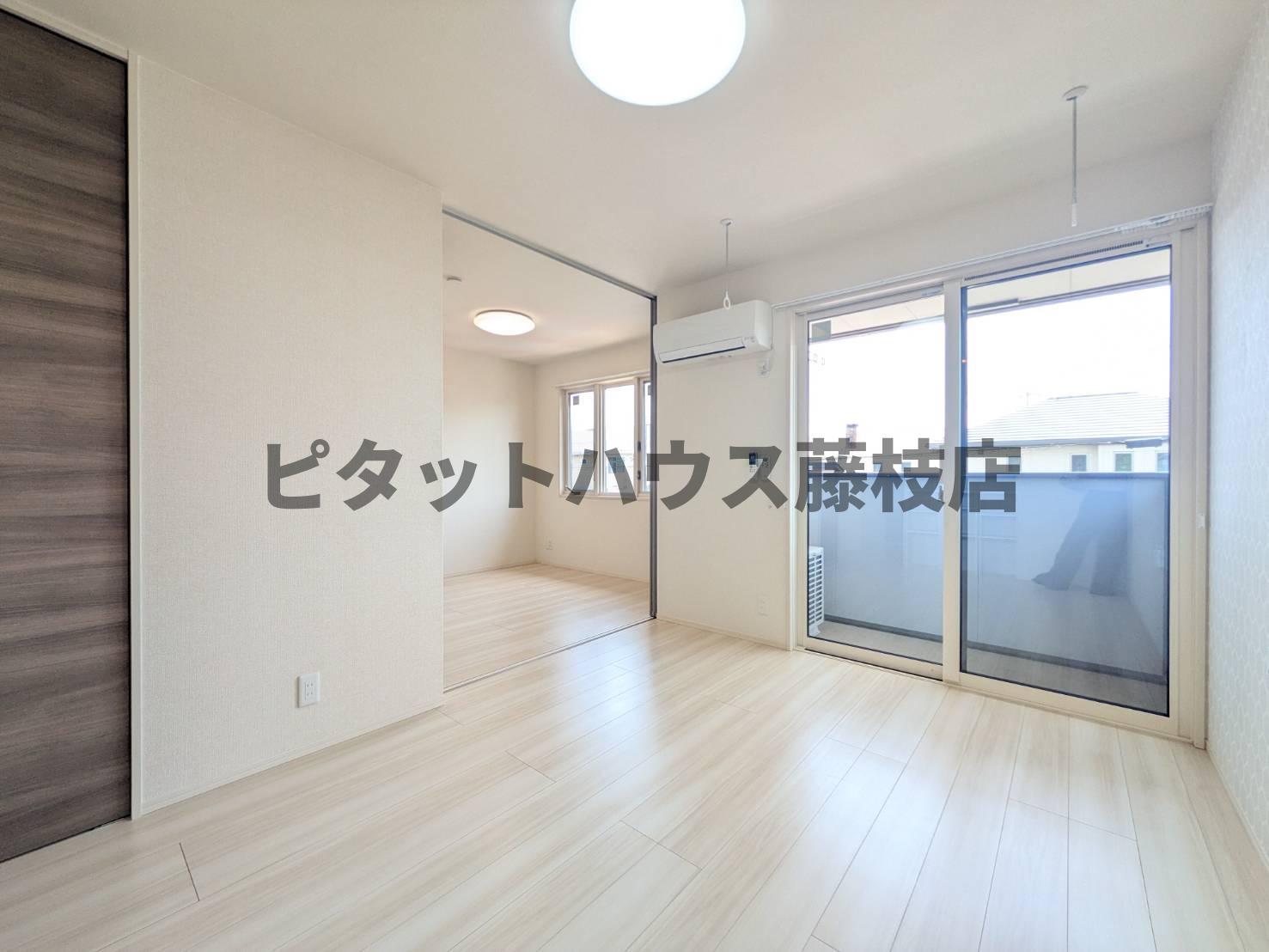 拡大写真:藤枝市南駿河台4丁目 2階202の居間