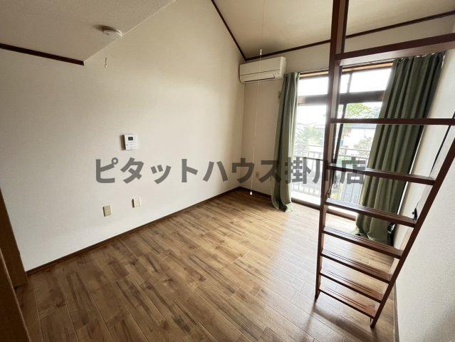拡大写真:袋井市方丈6丁目 2階205の居間