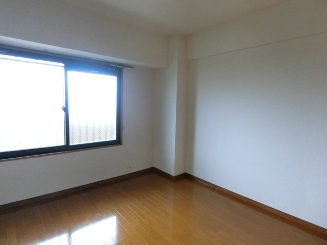 拡大写真:袋井市愛野東1丁目 2階202の居間