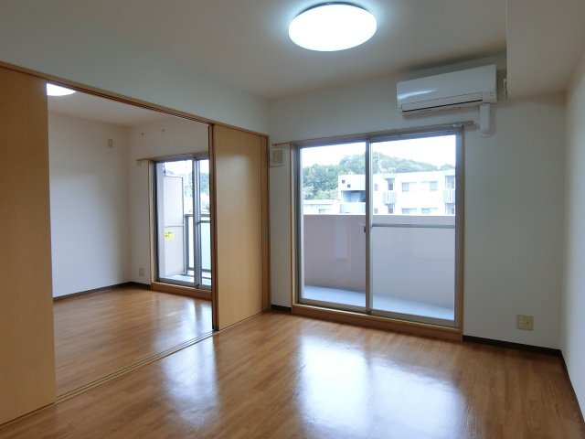 拡大写真:袋井市愛野南2丁目 4階405の居間
