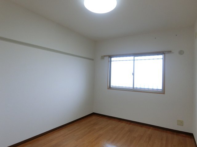 拡大写真:袋井市愛野南2丁目 4階405の居間